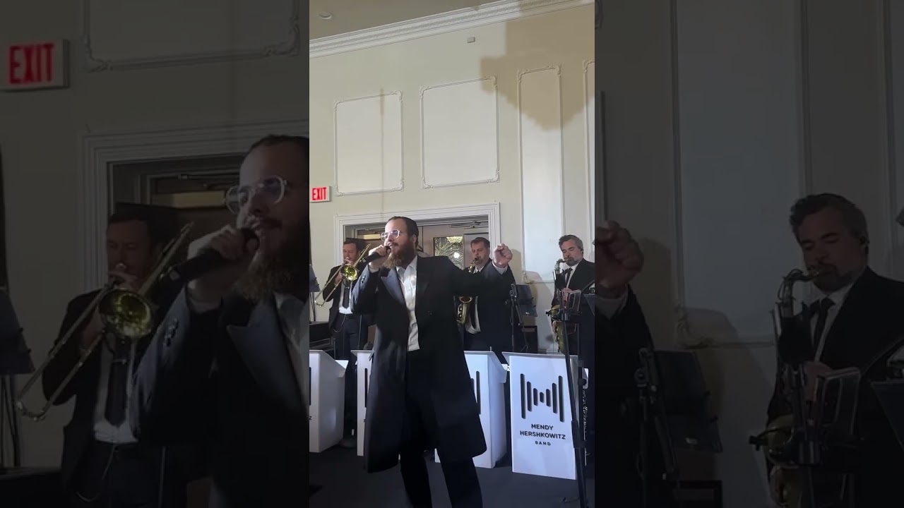 Yidi Bialastozky with Mendy Hershkowitz Band