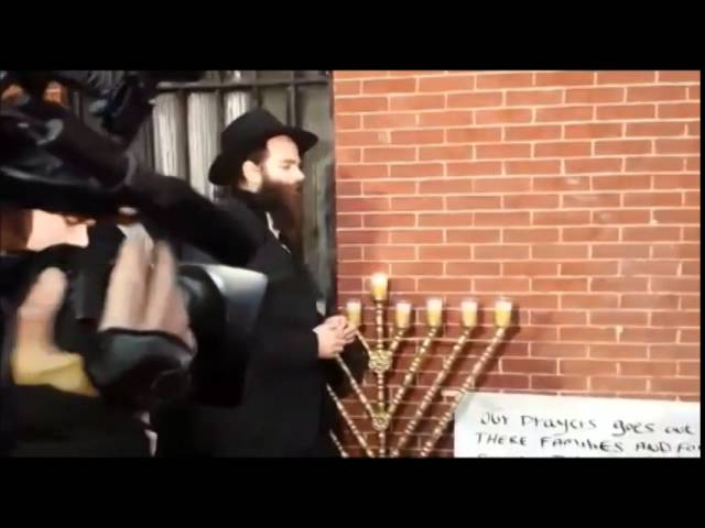 Lighting Menorah at the Location Where the 2 NYPD Officers Were Fatally Shot