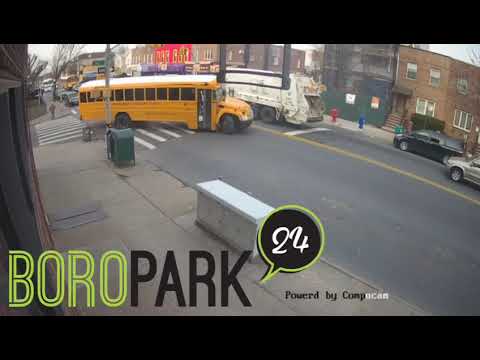 NYC Sanitation truck passes school bus with flashing red lights, on 18 Ave