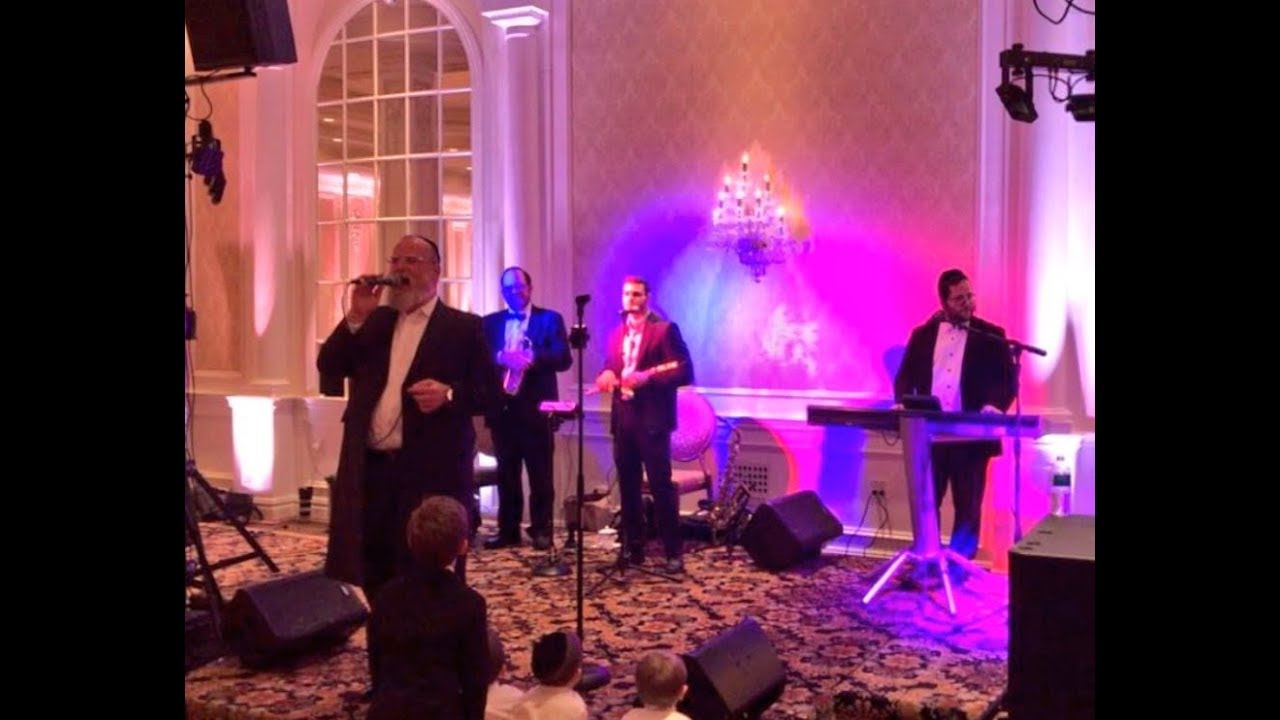 Michoel schnitzler rocking Asher bara at a wedding in Lakewood with dovi tesler