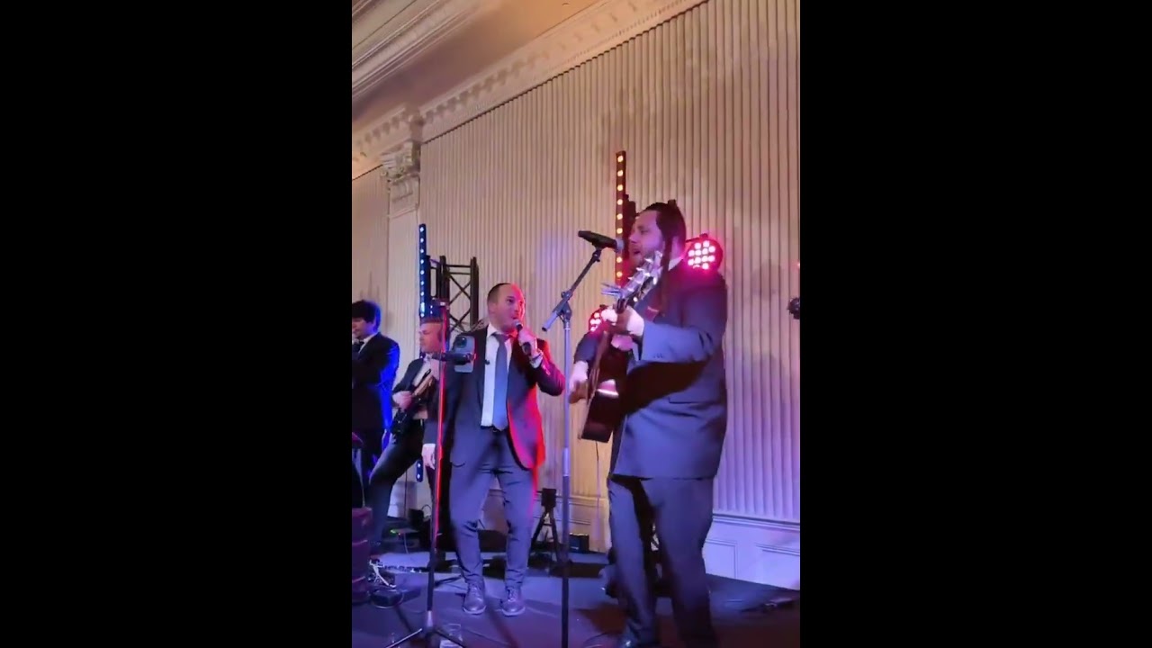 Joey Newcomb and Zalman Pollack with Menachem Manevitch