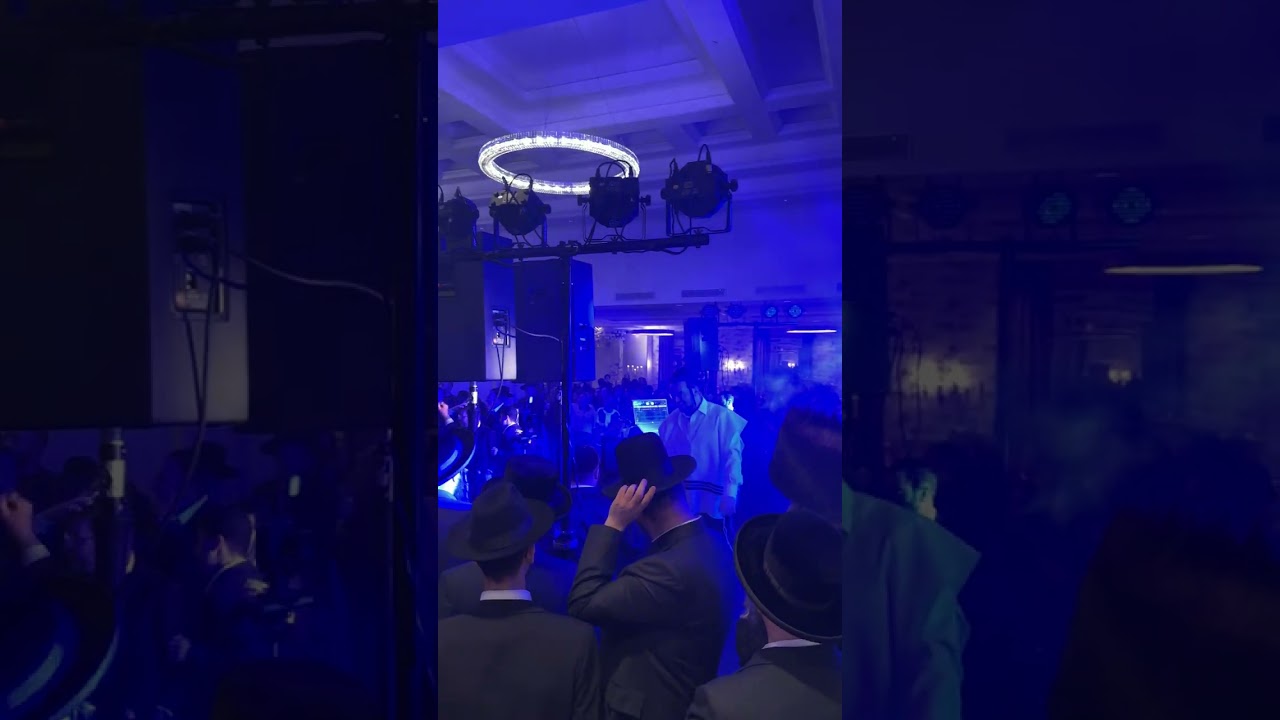 The wedding of Meilach Kohn’s niece. Shmueli Landau on DJ