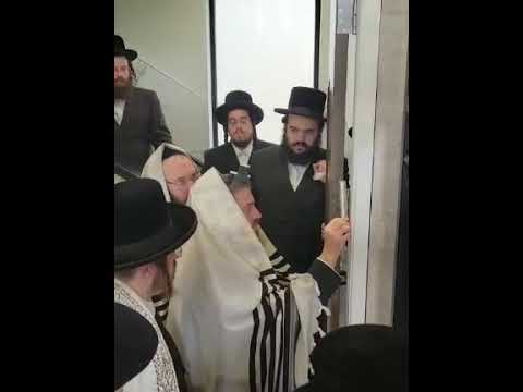 Sadigura Rebbe Affixing A Mezuzah