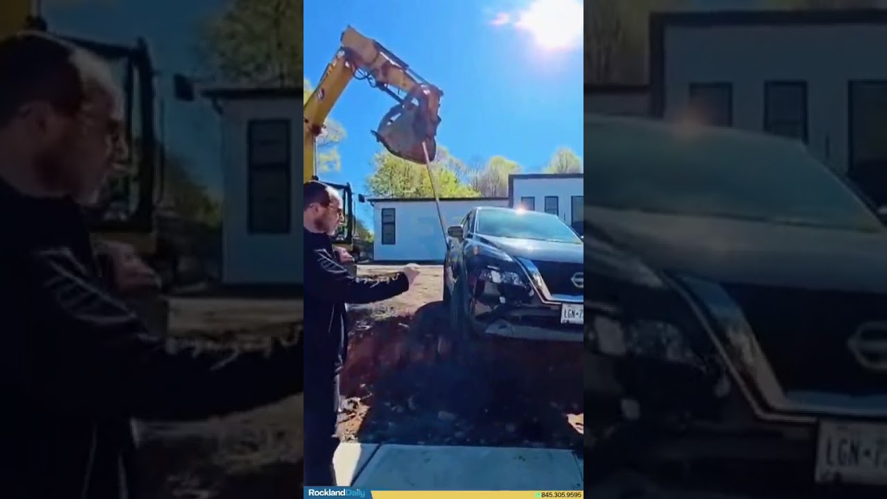 Chavivim and construction workers removed a car stuck in a ditch on Route 306 near Edison Ct, Monsey