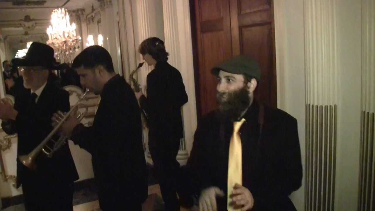 Jewish wedding music band Shir Soul escorts a newly married couple to the Yichud room