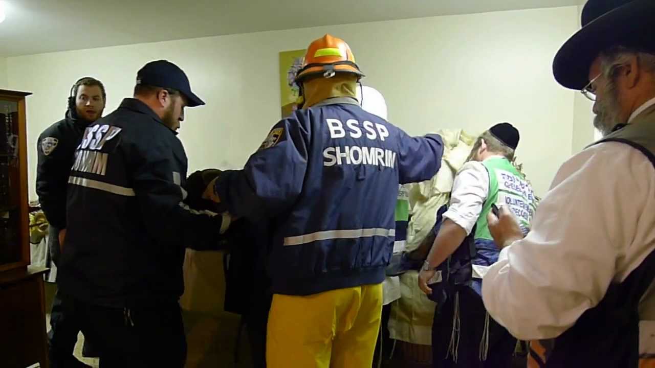Chesed Shel Emes recover Torah Scrolls from flooded Synagogues in Belle Harbour (Hurricane Sandy)