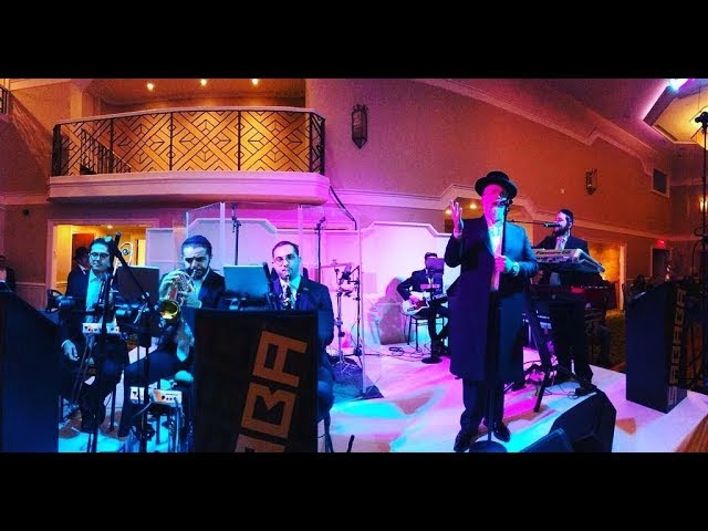 Michoel schnitzler with the great sababa band!