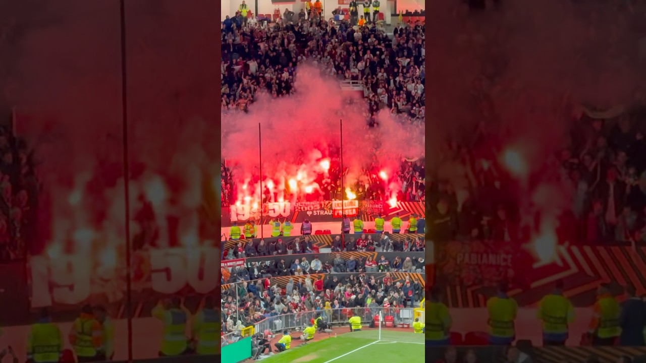 Crazy Lyon fans set of flares at Old Trafford #mufc #lyon #fans #flare #crazy