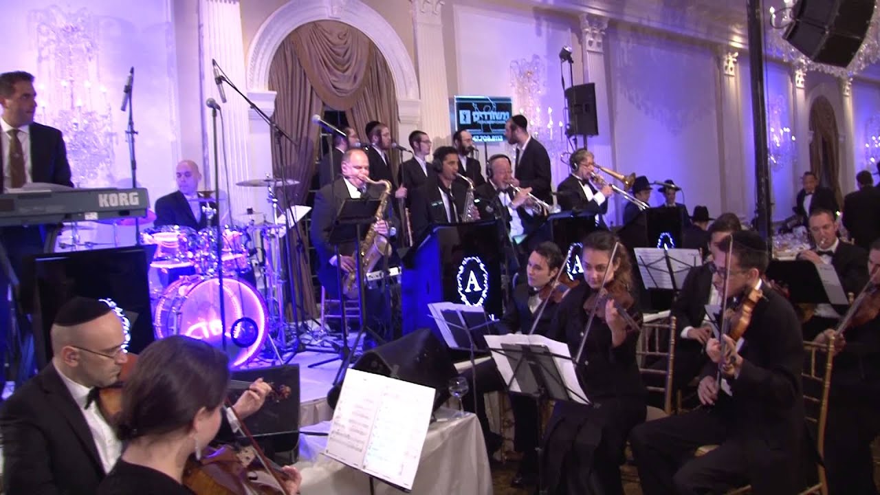 The A Team Orchestra - Meshorerim Choir - "Happy"