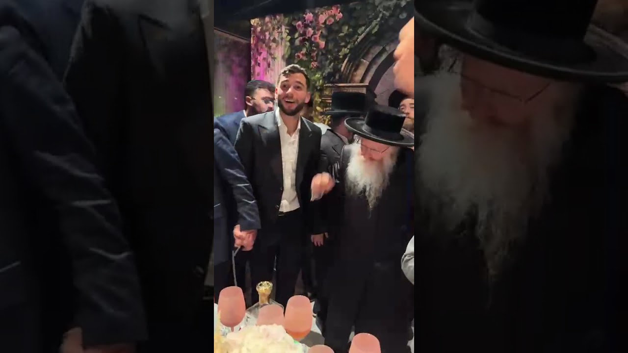 האדמור מקרטשעניף בריקודים באירוע בוטיק