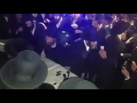 Crowds Greeting  Rava"d Eida Hachareidis R' Moshe Shternbuch At New Ark Airport