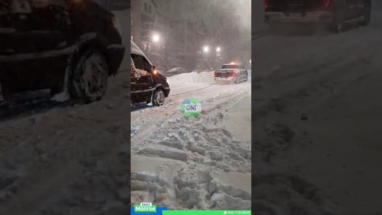 Chaveirim pulled a van out of the snow on Austra Parkway during the blizzard.
