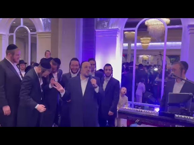 Lipa Schmeltzer Singing 'Happy Birthday' to a Chosson at his Wedding