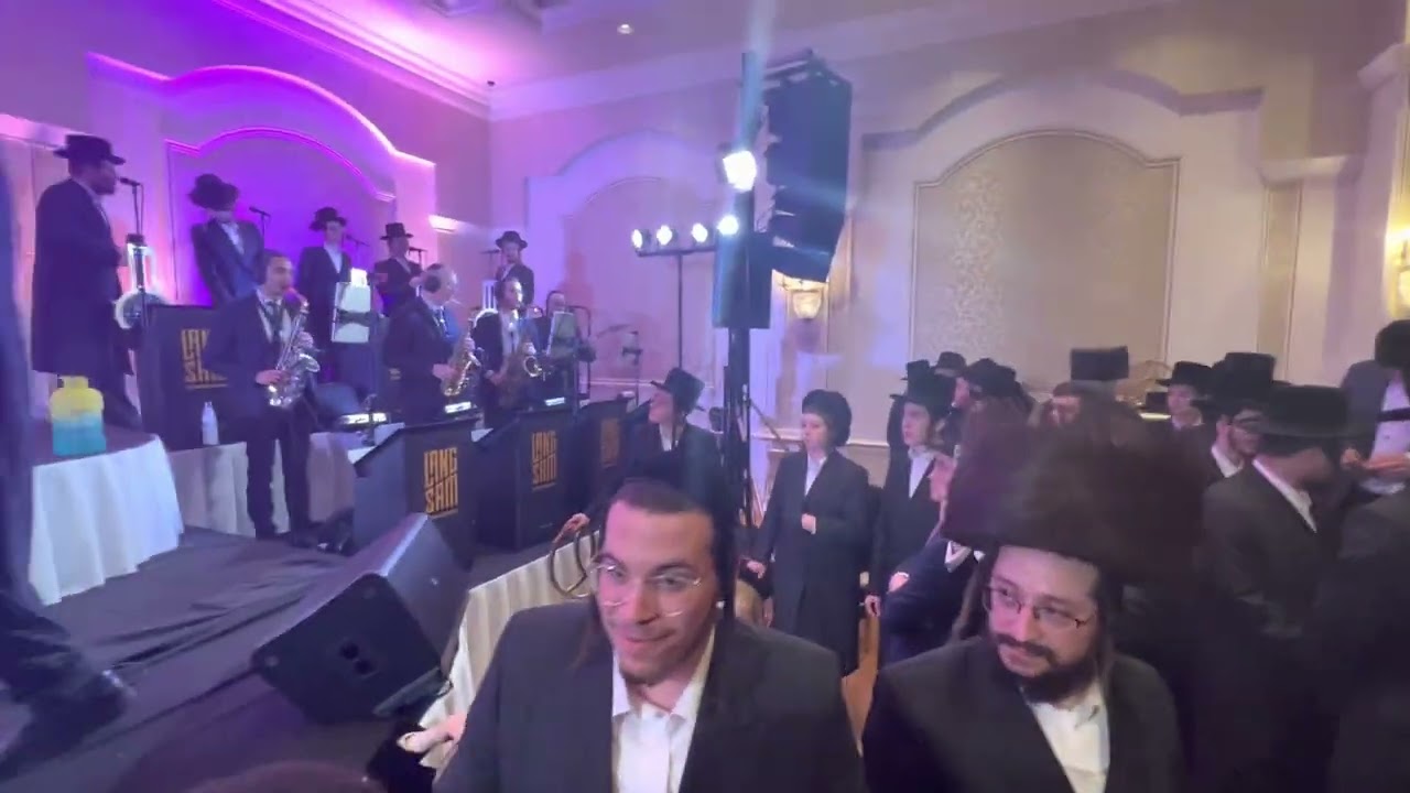 Singer Lipa Schmeltzer & Shira Choir at Moshe Langsam Wedding | Hershy Langsam on the keys.