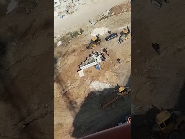 Truck flips on N. Israeli construction site
