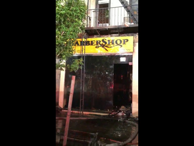 Seforim survive fire in Flatbush barber shop