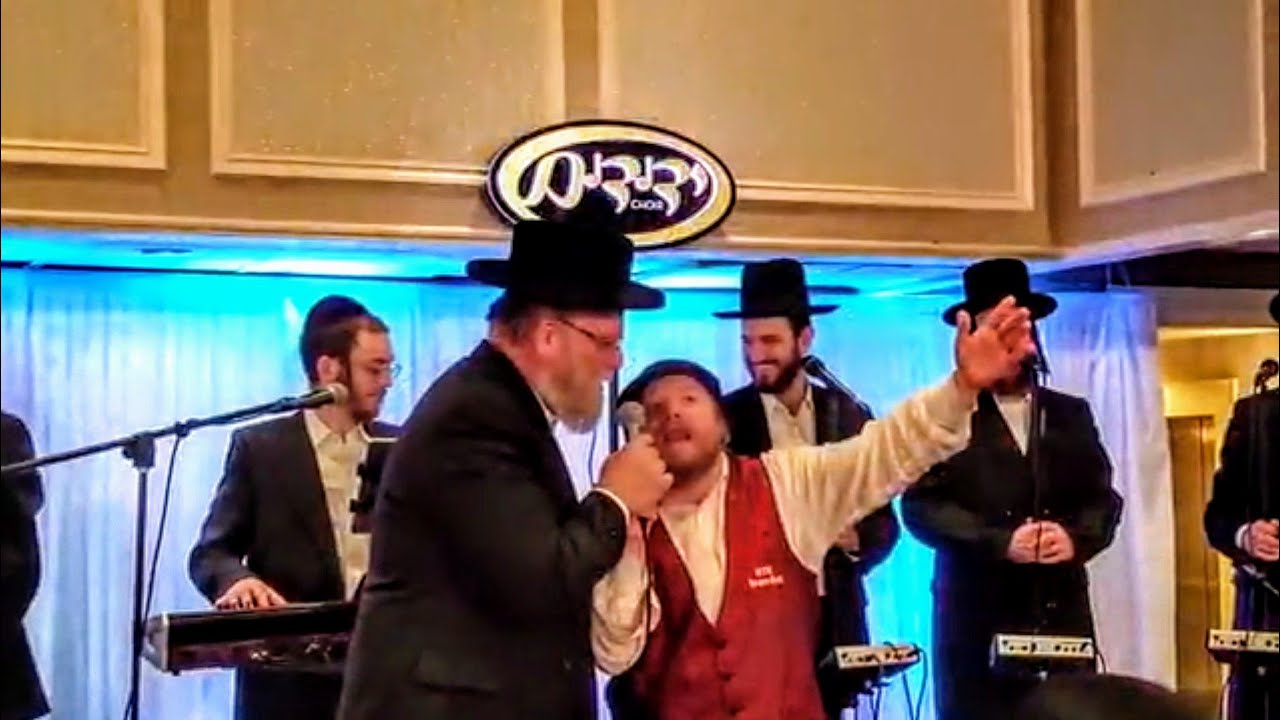 Michoel schnitzler rocking with rafie the king! At a wedding in bp.