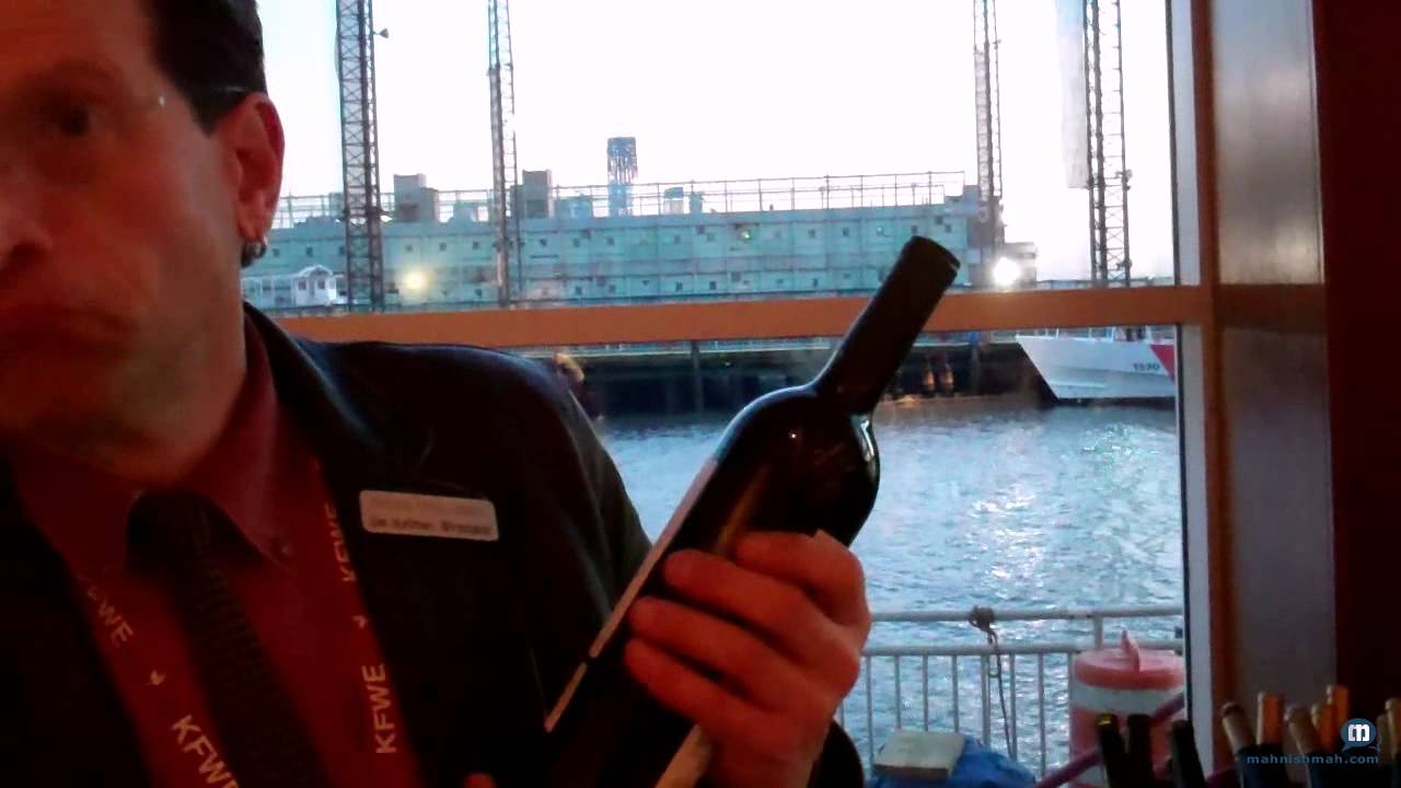 Wine Maker Explaining New Wine At Wine Show 2012