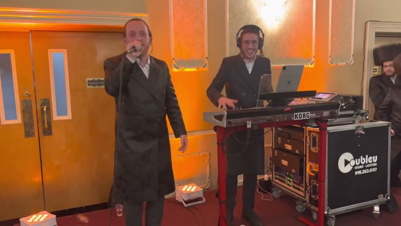 Levi Lesin on keys singing with Sruly green