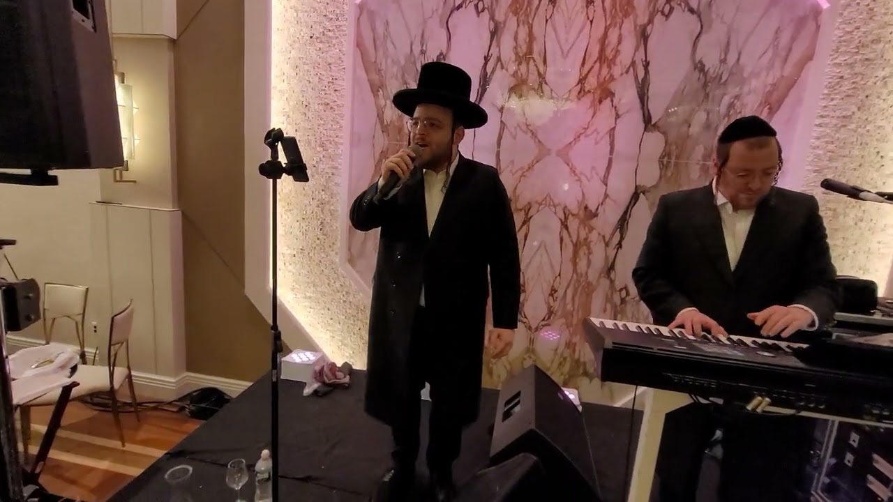 Sruly Singer on the keys & Zrilly Werzberger