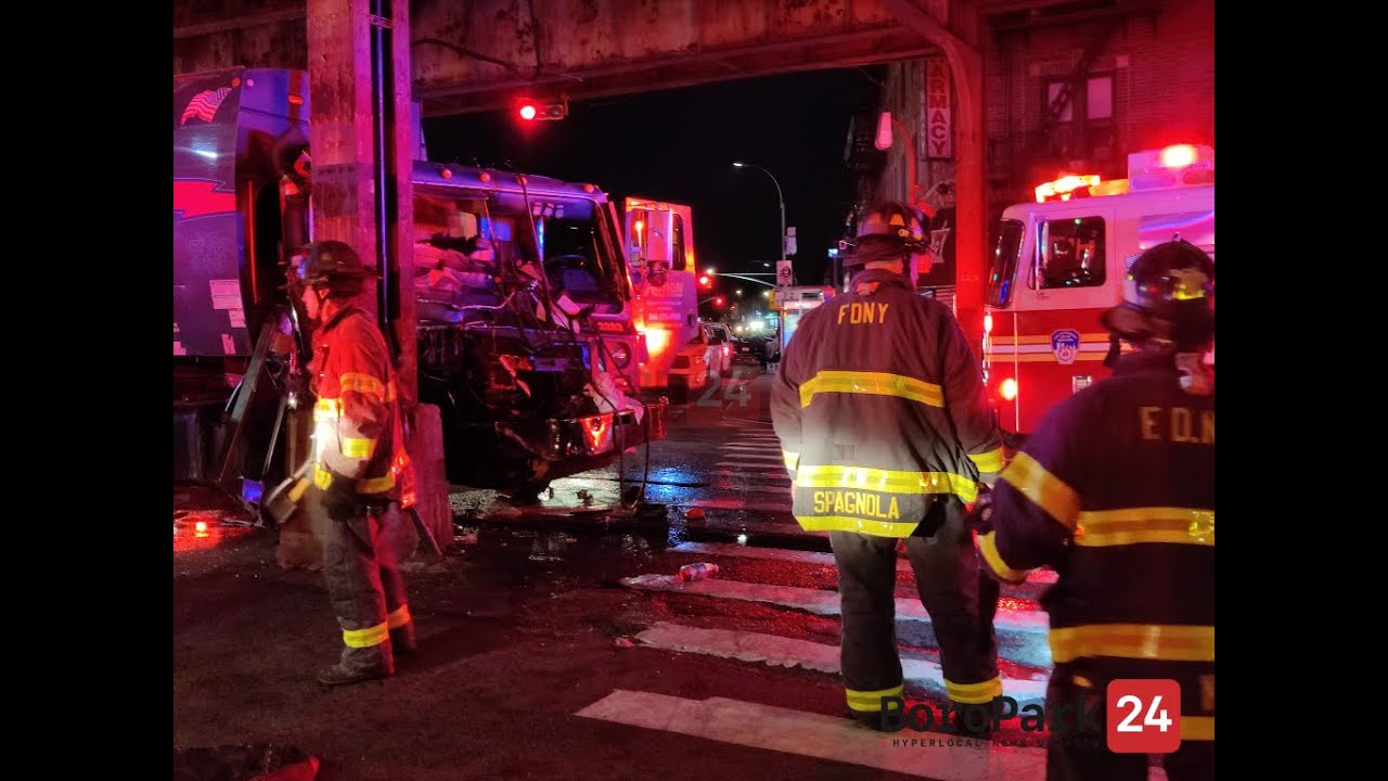 Sanitation Truck Hits Subway Pole, Driver Extracted